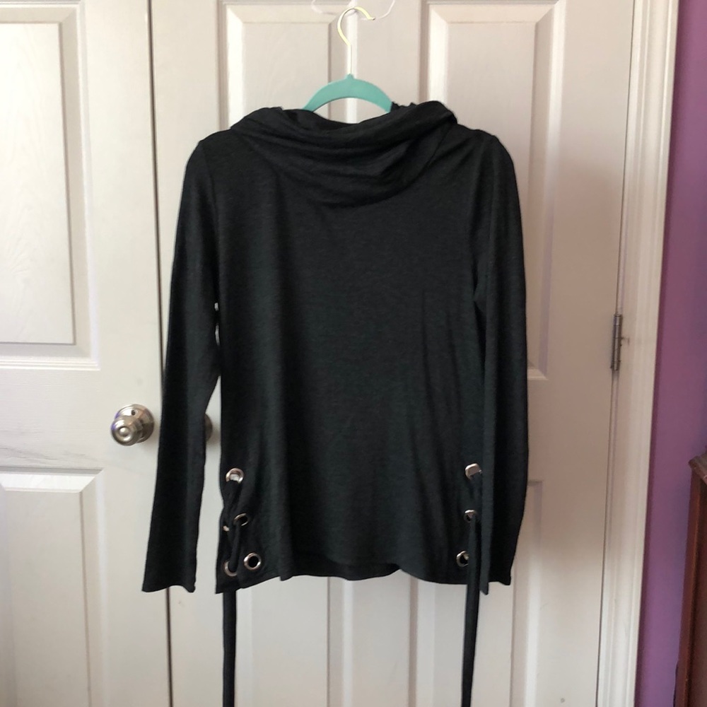 This is a long sleeve turtle neck sweater